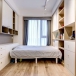 现代风格二居室卧室组合柜装修设计图